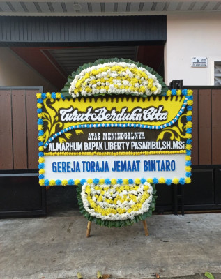 Papan Bunga Duka di Muara Satu